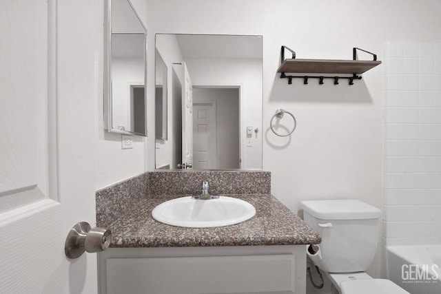 313 Mission St, Mc Farland, CA 93250 - bathroom featuring a bathing tub, toilet, a shower, and vanity