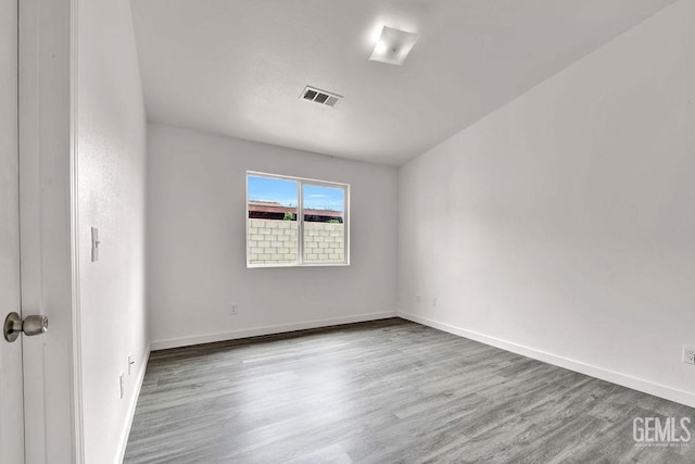 313 Mission St, Mc Farland, CA 93250 - unfurnished room featuring wood finished floors and baseboards