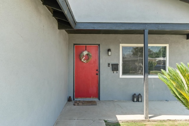 262 Olson Ave, Shafter, CA 93263 - property entrance with stucco siding
