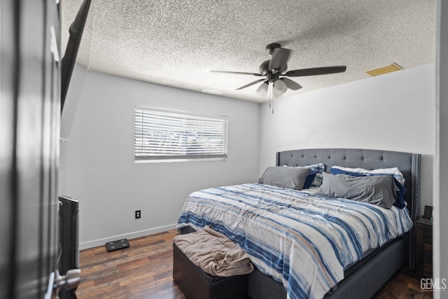 262 Olson Ave, Shafter, CA 93263 - bedroom with wood finished floors, a ceiling fan, and a textured ceiling