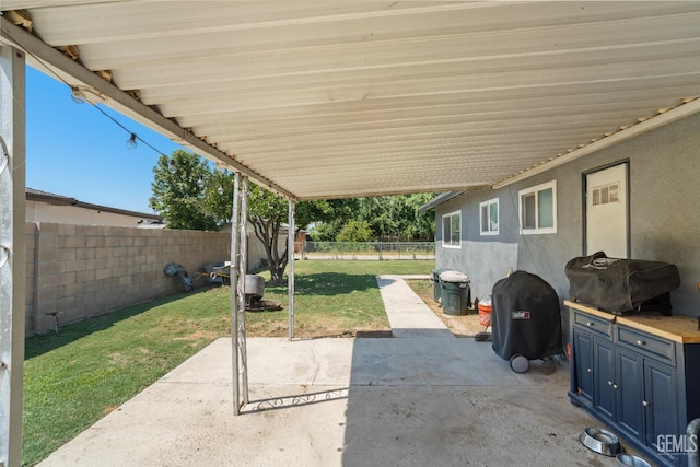 262 Olson Ave, Shafter, CA 93263 - fenced backyard featuring a patio and area for grilling