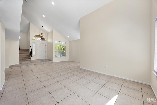 6209 Ambergrove St, Bakersfield, CA 93313 - entryway featuring light tile patterned floors, stairs, high vaulted ceiling, and recessed lighting