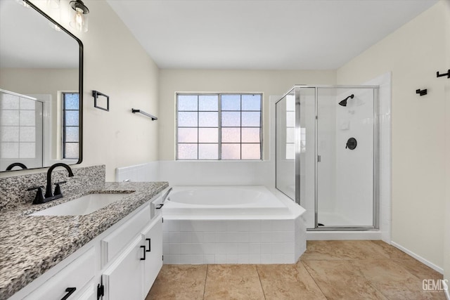 6209 Ambergrove St, Bakersfield, CA 93313 - bathroom with vanity, a garden tub, and a shower stall