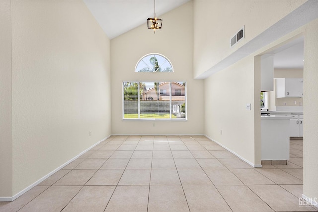 6209 Ambergrove St, Bakersfield, CA 93313 - empty room with high vaulted ceiling and light tile patterned flooring