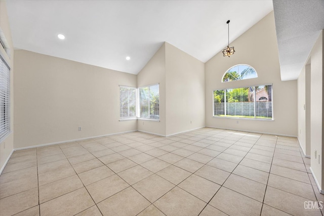 6209 Ambergrove St, Bakersfield, CA 93313 - unfurnished room featuring high vaulted ceiling, light tile patterned floors, and recessed lighting