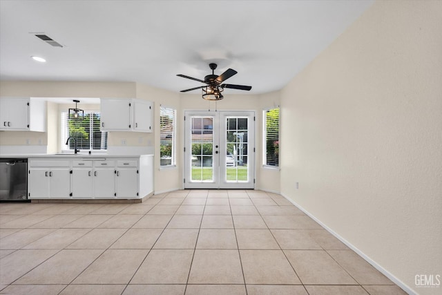 6209 Ambergrove St, Bakersfield, CA 93313 - kitchen featuring stainless steel dishwasher, light countertops, french doors, white cabinets, and ceiling fan