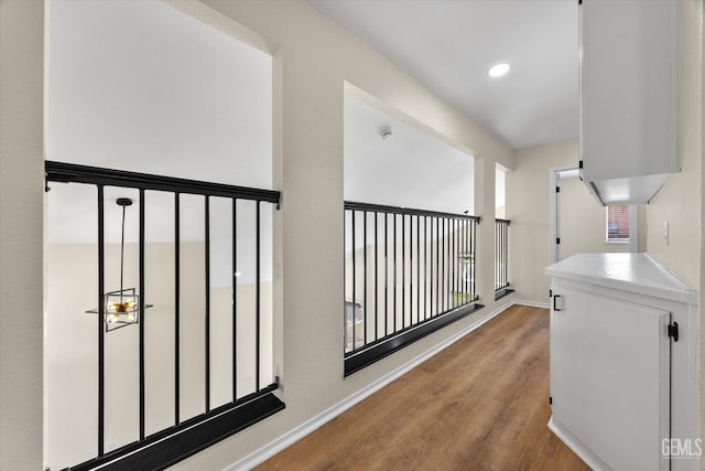 6209 Ambergrove St, Bakersfield, CA 93313 - hallway featuring light wood-style floors and recessed lighting