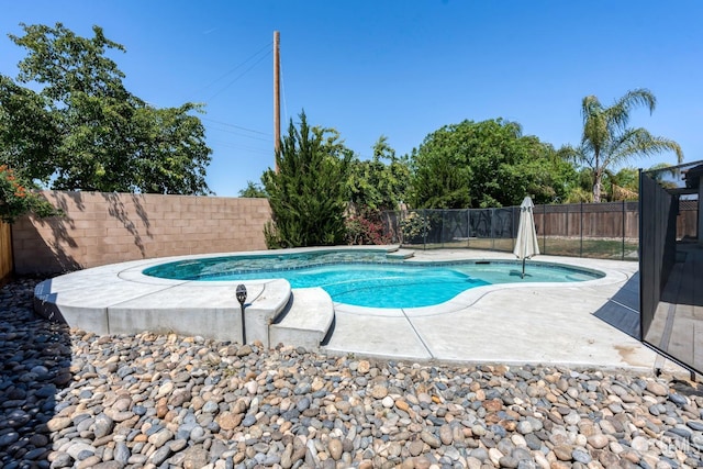 15020 Cotton Blossom Ave, Bakersfield, CA 93314 - view of swimming pool featuring a fenced backyard and a patio area
