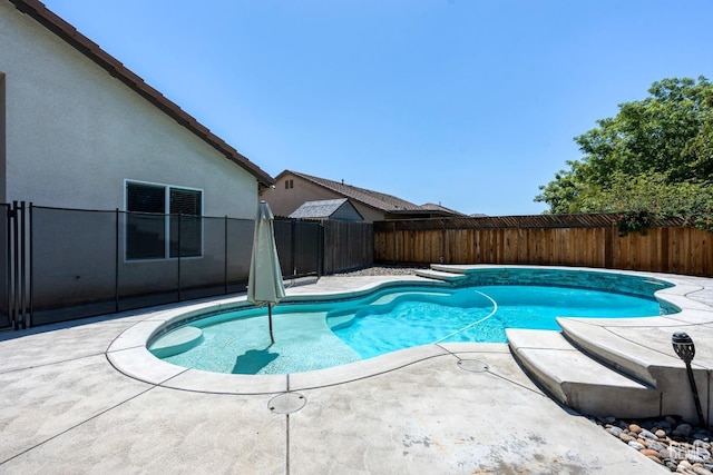 15020 Cotton Blossom Ave, Bakersfield, CA 93314 - view of swimming pool featuring a fenced backyard and a patio area