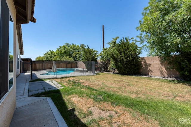 15020 Cotton Blossom Ave, Bakersfield, CA 93314 - view of yard with a patio