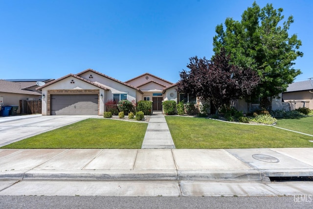 15020 Cotton Blossom Ave, Bakersfield, CA 93314 - view of front of property with stucco siding, a tiled roof, a garage, a front yard, and driveway