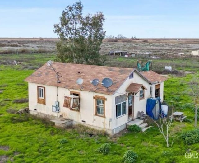 28112 Pond Rd, Wasco, CA 93280 - back of house with crawl space and stucco siding