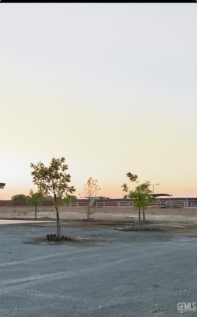 28112 Pond Rd, Wasco, CA 93280 - view of yard at dusk