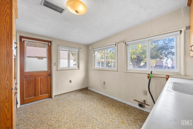 13754 Rosedale Hwy, Bakersfield, CA 93314 - interior space featuring sink and a textured ceiling