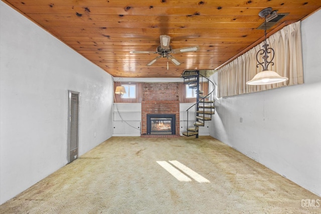 13754 Rosedale Hwy, Bakersfield, CA 93314 - unfurnished living room featuring ceiling fan, a fireplace, carpet flooring, and wooden ceiling