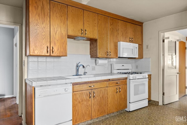 13754 Rosedale Hwy, Bakersfield, CA 93314 - kitchen featuring sink, tile counters, backsplash, and white appliances