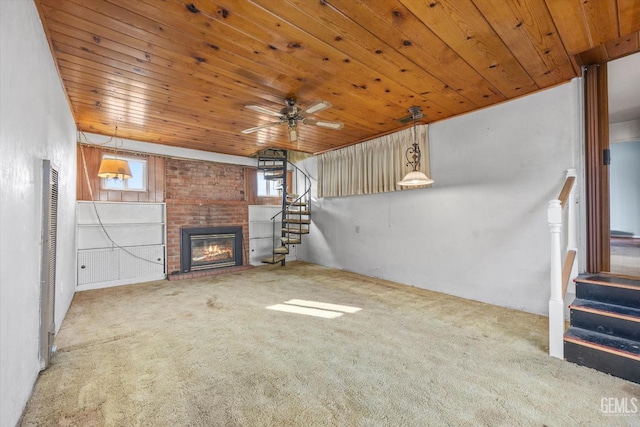 13754 Rosedale Hwy, Bakersfield, CA 93314 - unfurnished living room with wood ceiling, carpet floors, and a brick fireplace