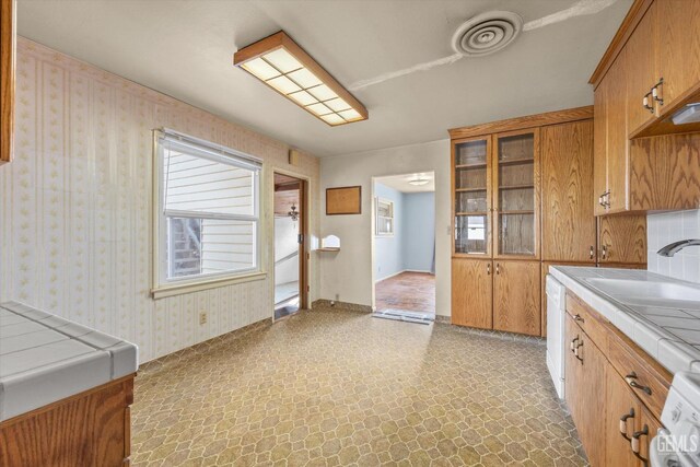 13754 Rosedale Hwy, Bakersfield, CA 93314 - kitchen with washer / dryer, sink, and white dishwasher