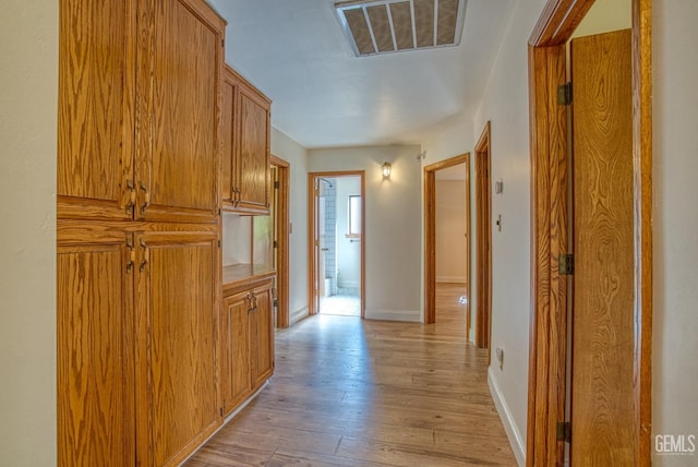 hall featuring light wood-type flooring