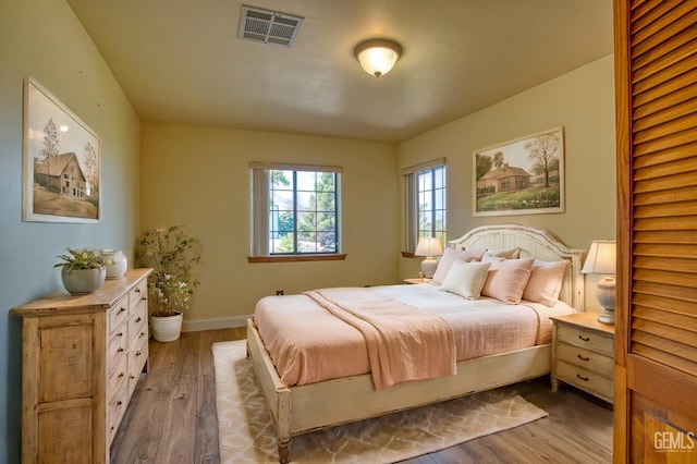 bedroom featuring hardwood / wood-style floors