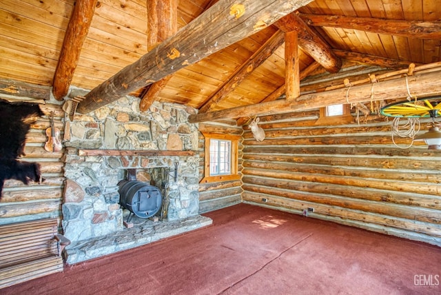 unfurnished living room with beamed ceiling, high vaulted ceiling, rustic walls, and wood ceiling