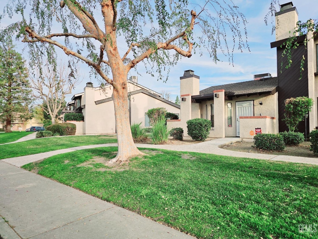 view of front of home with a front yard