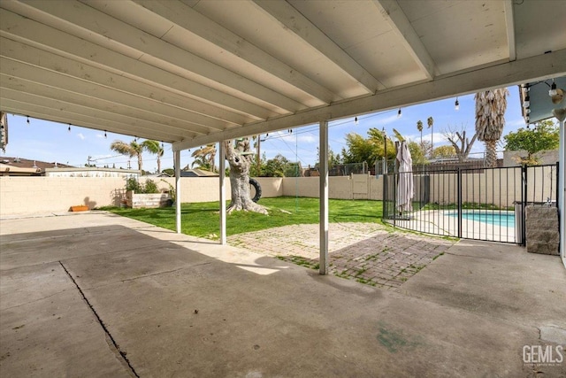 view of patio featuring a fenced backyard and a fenced in pool