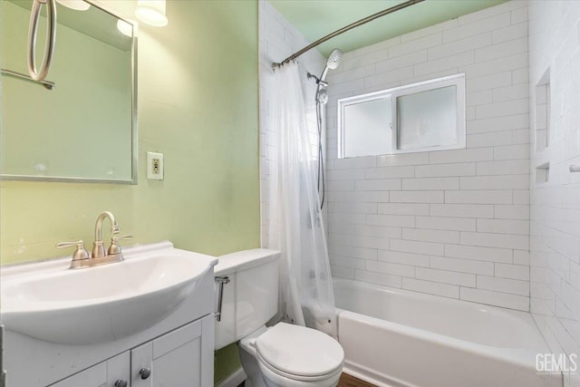 full bathroom with vanity, toilet, and shower / bath combo with shower curtain