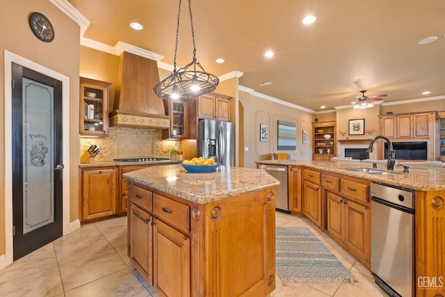 2801 Trengate Way, Bakersfield, CA 93311 - kitchen with a kitchen island with sink, appliances with stainless steel finishes, custom exhaust hood, decorative backsplash, and light tile patterned floors