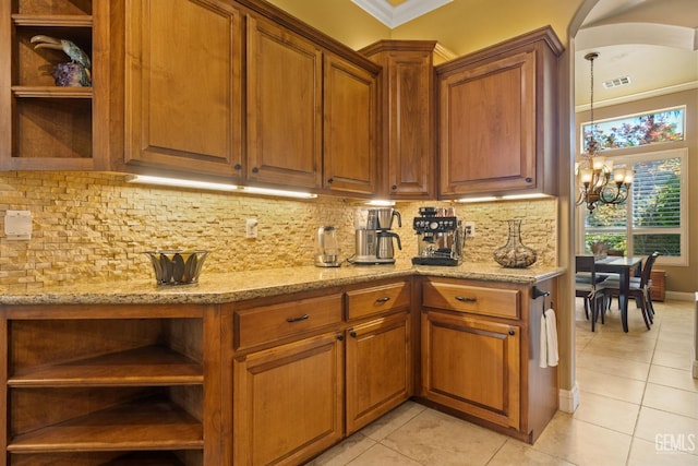 2801 Trengate Way, Bakersfield, CA 93311 - kitchen featuring open shelves, light tile patterned floors, light stone counters, and crown molding