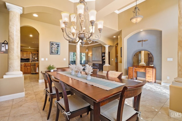 2801 Trengate Way, Bakersfield, CA 93311 - dining area with ornate columns, light tile patterned flooring, a high ceiling, a chandelier, and arched walkways