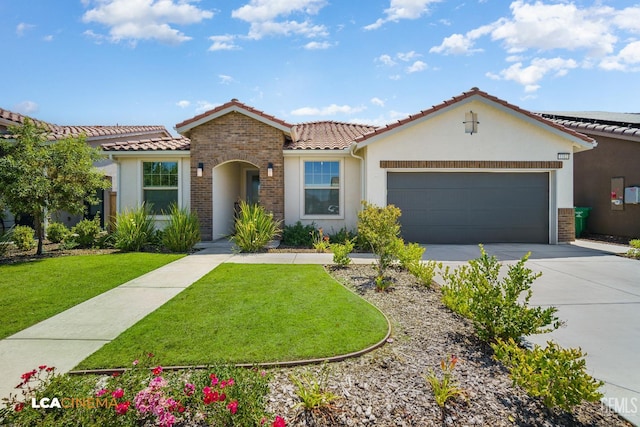 3312 Whispering Brook Ln, Shafter, CA 93263 - mediterranean / spanish-style house featuring a tile roof, an attached garage, stucco siding, concrete driveway, and a front yard