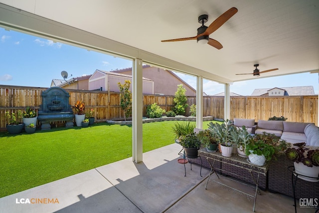 3312 Whispering Brook Ln, Shafter, CA 93263 - fenced backyard with a patio area, a ceiling fan, and outdoor lounge area