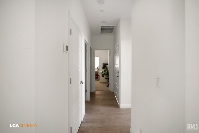 3312 Whispering Brook Ln, Shafter, CA 93263 - hall featuring wood finished floors and baseboards