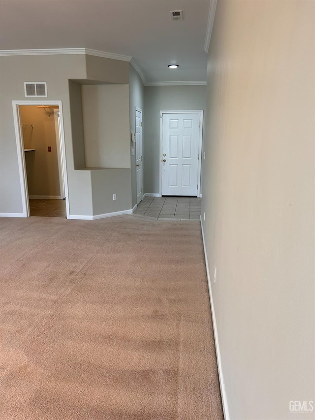 interior space with crown molding
