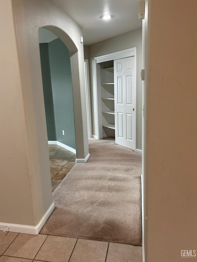 hall featuring carpet floors
