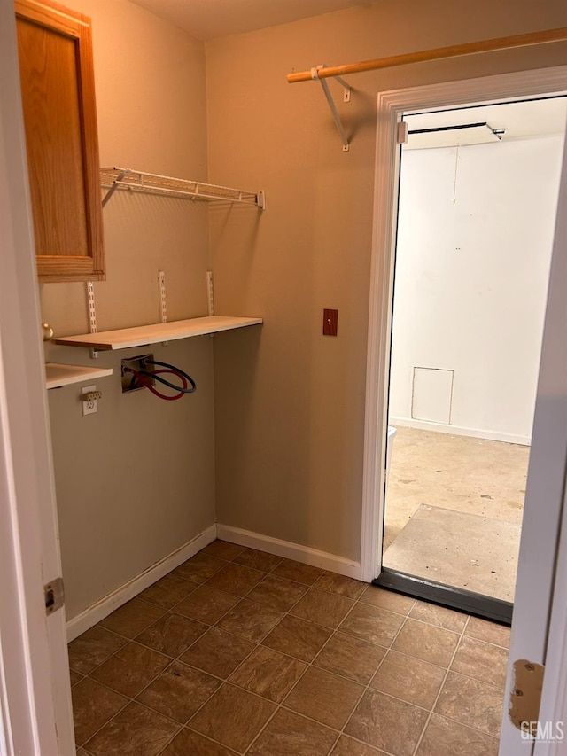 clothes washing area featuring hookup for a washing machine