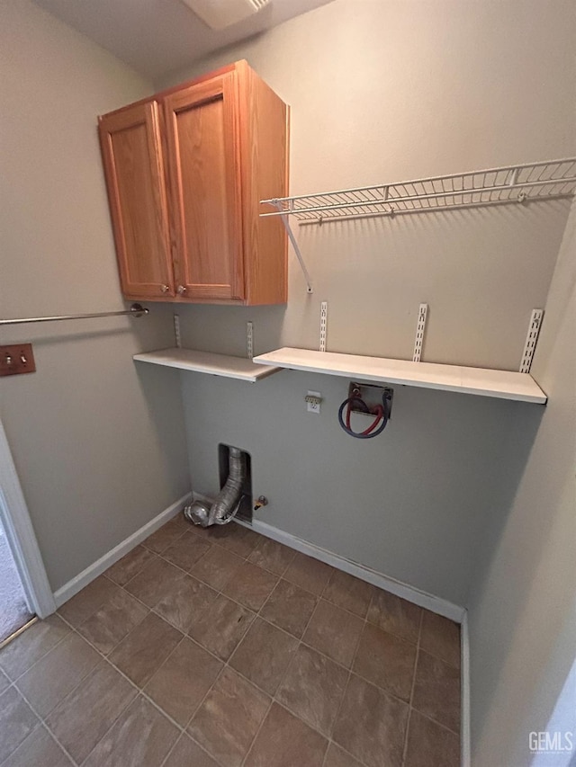 laundry room featuring cabinets, gas dryer hookup, and washer hookup