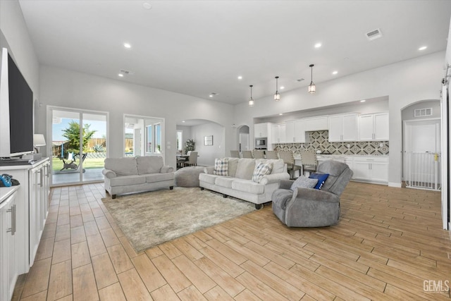 living room with light hardwood / wood-style floors