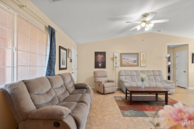 living room with ceiling fan and vaulted ceiling