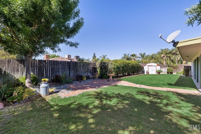 view of yard with a shed and an outdoor structure