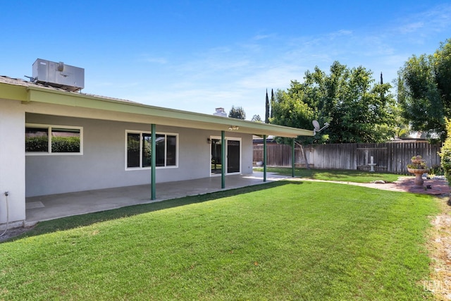 view of yard featuring a patio and cooling unit
