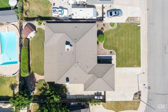 drone / aerial view of a pool