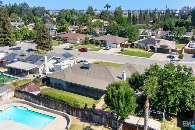 aerial perspective of suburban area with a pool area