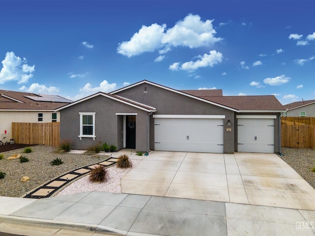 single story home featuring a garage