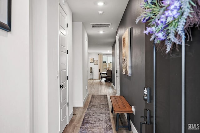 hall featuring hardwood / wood-style floors