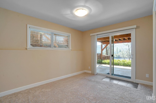 view of carpeted spare room