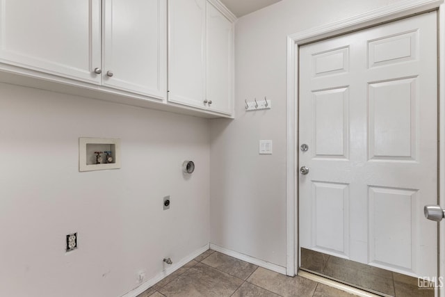 washroom with washer hookup, light tile patterned floors, cabinet space, electric dryer hookup, and baseboards