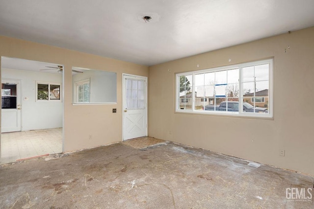 interior space featuring ceiling fan