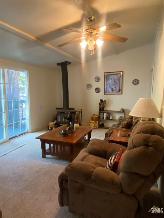 44212 Old Stage Rd, Posey, CA 93260 - living room featuring a wood stove, ceiling fan, and carpet